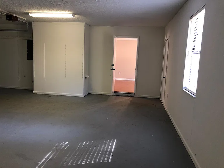 Garage entrance to house & backyard