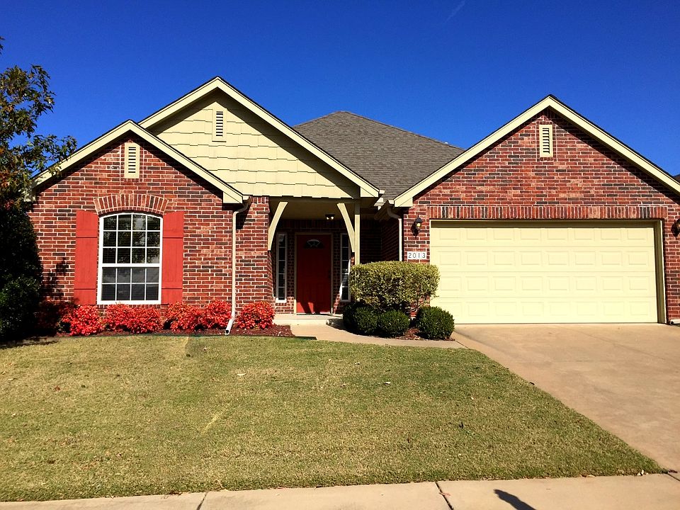Immaculate one level full brick home with professional landscaping and sprinkler system.