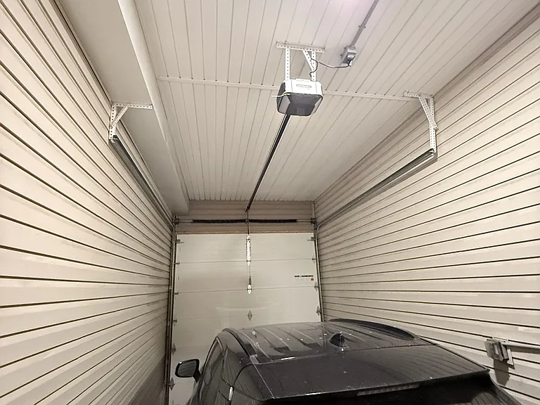 Garage with secured remote control door + camera