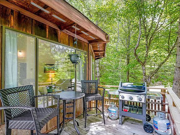 Deck with grill and chairs 