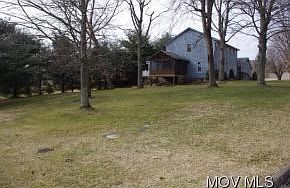 Large level landscaped yard