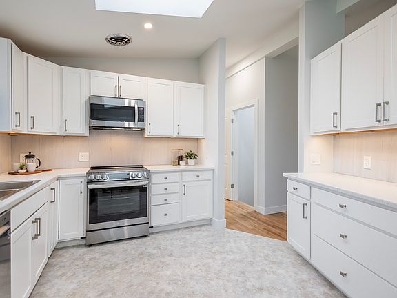 Spacious kitchen with stainless steel appliances