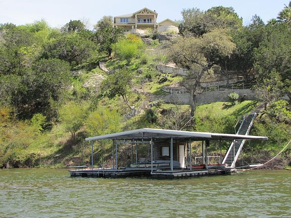 view of dock and house