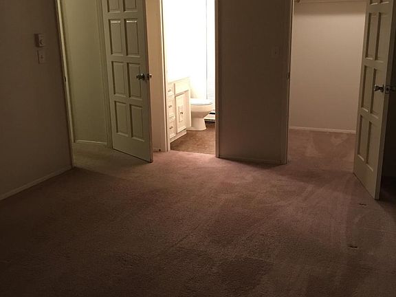 Master bedroom w/walk-in closet and 1/2 bath