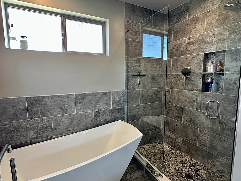 Primary shower & tub.