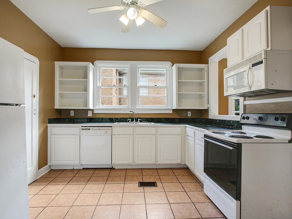 Large open kitchen with pass through to breakfast nook.