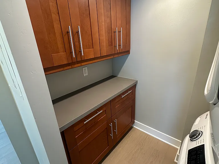 Laundry room cabinets and fold area.