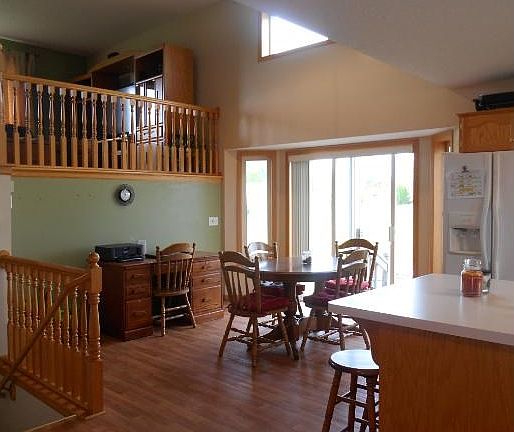 View of the dining area that walks out to a nice patio for grilling.