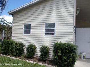 863 Tamarind Cir, Barefoot Bay, FL 32976