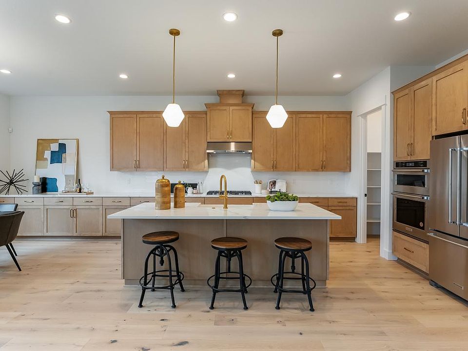 Open-concept kitchen with casual dining area