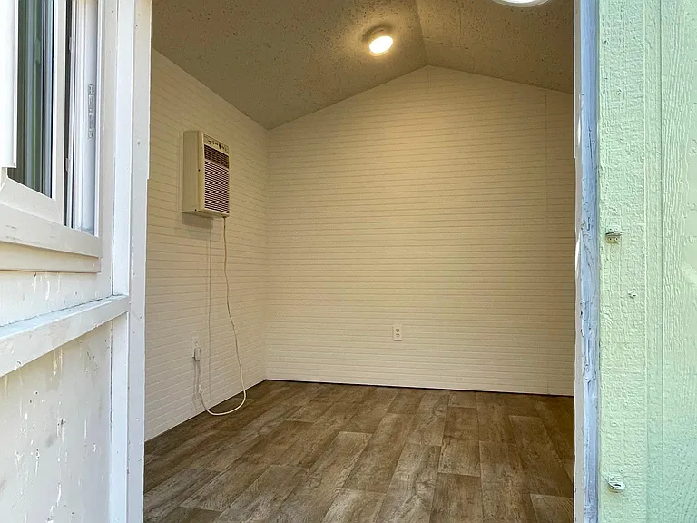 Shed/extra space conversion.
A/C, lights, small skylight, power.