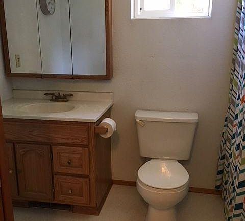 One of three bathrooms