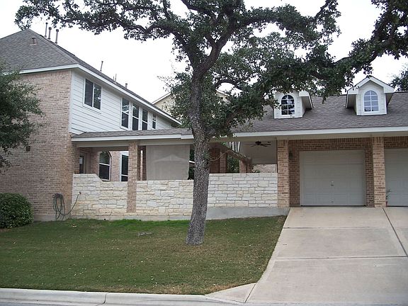 View of home from side showing detached garage