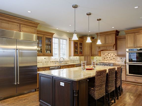 Gourmet Kitchen with professioal grade ss appliances and walk in pantry