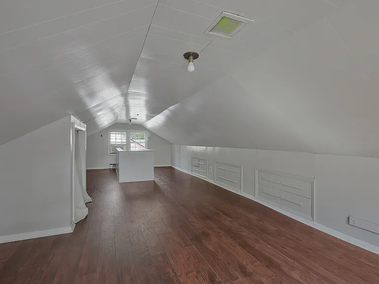 Photo 21. Upper level Loft with more storage, can be used as a Fourth Bedroom or as a Family Room