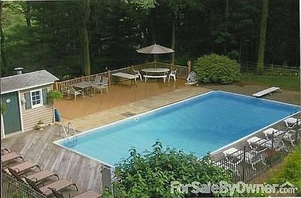 Pool with deck and cabana
						:
						Perennial garden with mature cutting garden next to pool