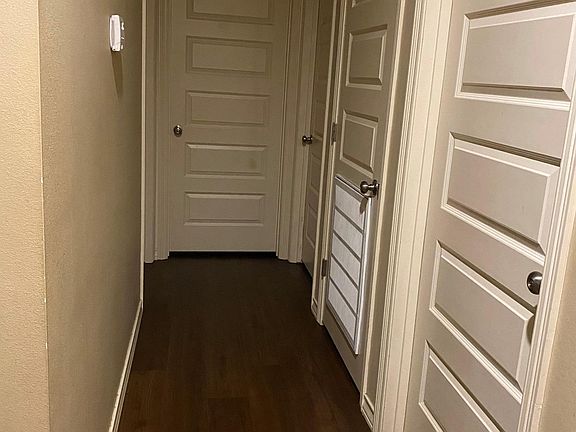 Upstairs Hallway between bathroom and 3 bedrooms