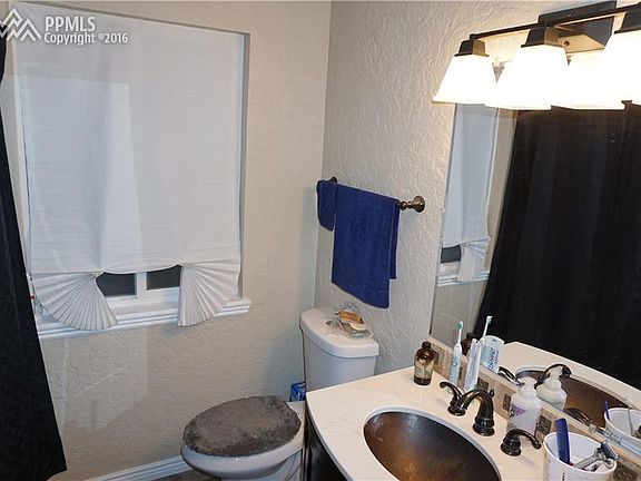 Custom Hand Texture in the Bathroom, Along with Newer Fixtures.