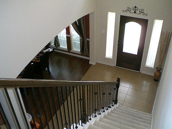 VIEW FROM THE SECOND FLOOR OF THE TWO STORY FOYER