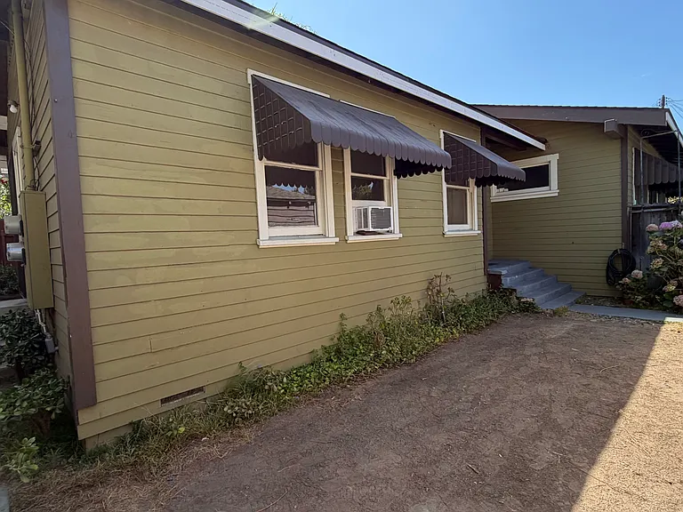 Private front yard will have a paver deck area.