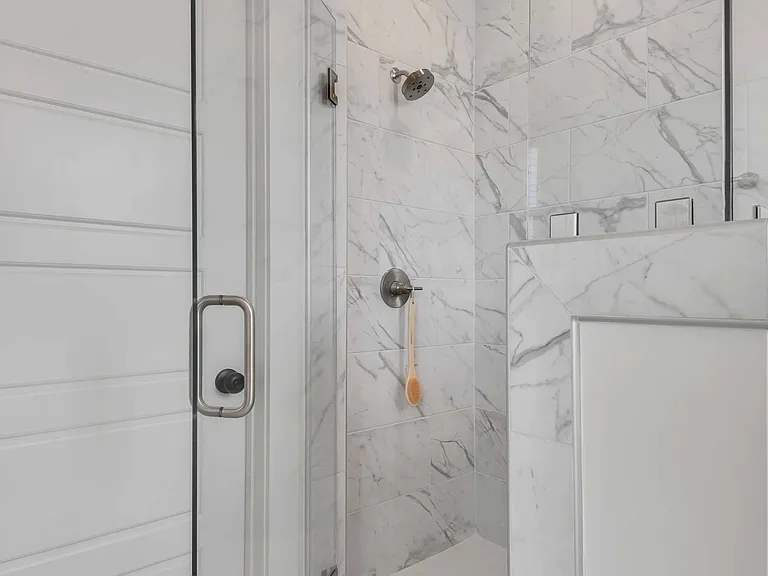 Fully-Custom, Tiled Master Shower Suites