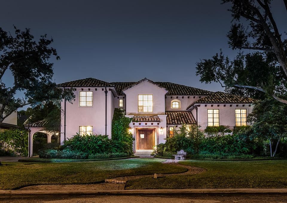 This refined home, custom-built by the owners with Newberry Campa Architects, offers authentic Spanish Colonial Revival architecture.