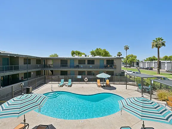Pool and poolside area at Cornell Apartments.