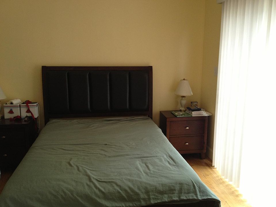 Bedroom #2 (back) with a window/sliding door