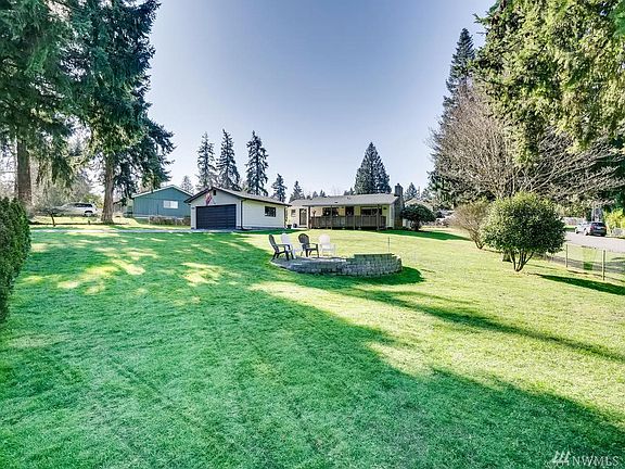 So much room to run and play!  Or relax and enjoy!  Firepit ready to enjoy
