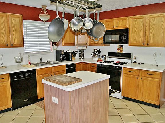 HUGE OPEN ISLAND KITCHEN WITH LOTS OF CABINETS