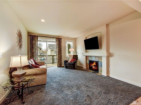 Spacious living area leads out to your balcony. 