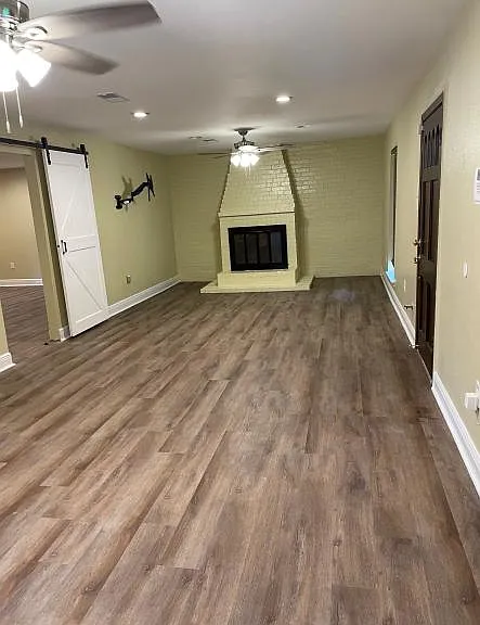 Welcome home to a bright and open living/dining space that blends comfort with character. Highlights include:
- __ Cozy fireplace as the centerpiece for gatherings and quiet evenings
- ___ Two large ceiling fans for enhanced airflow and energy efficiency