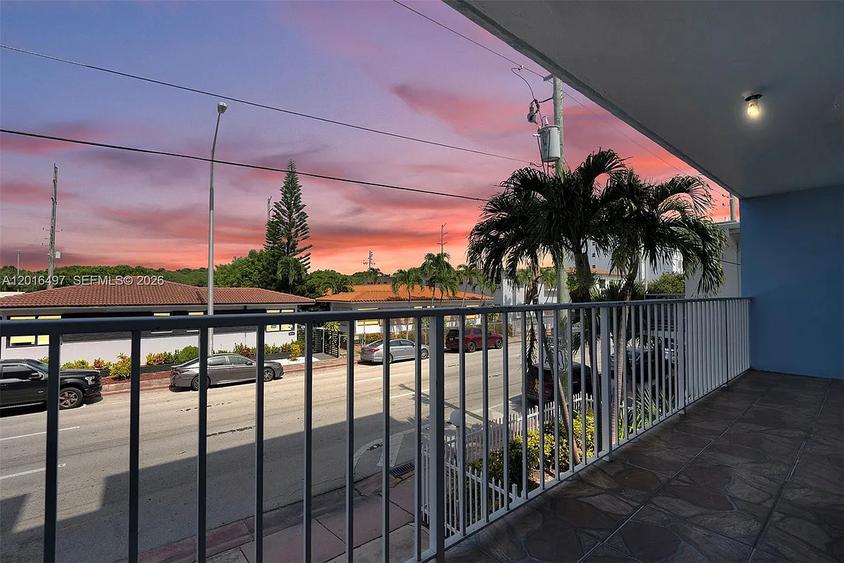 Building Photo - 8340 Harding Ave #201