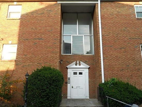 Front of building. Maintenance and landscaping included in r