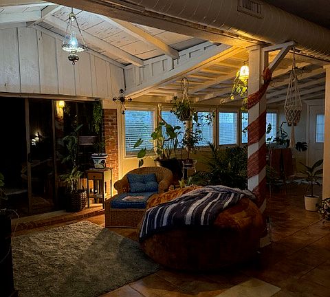 Living area. To the left is the extra room that can be used as office, playroom or hobby room. The area at the back right is commonly a dining area.