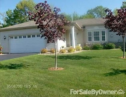 Front of Twinhome
						:
						Three beautiful oak trees on lot.