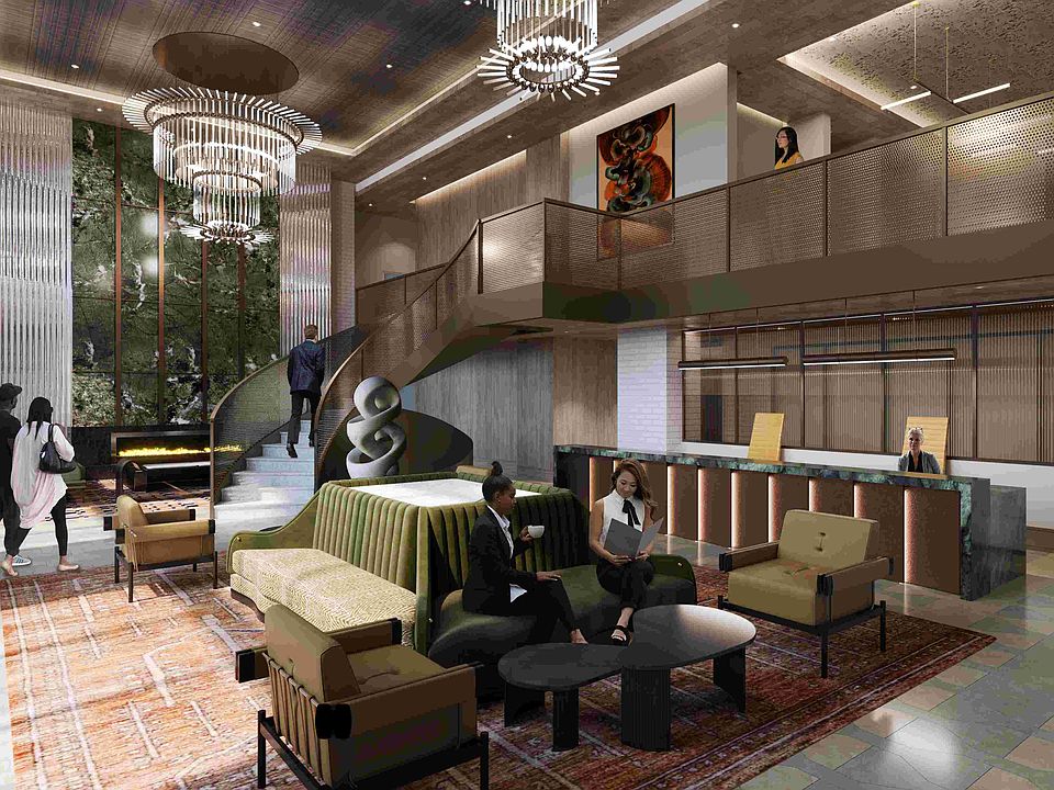 A welcoming lobby defined by soaring ceilings, curated art, and attentive service.