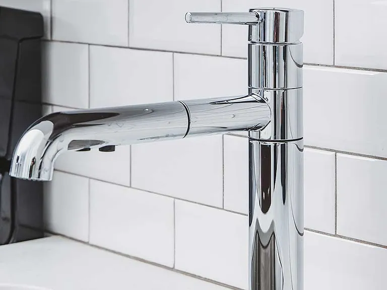 Chrome kitchen faucet with pull down spray head