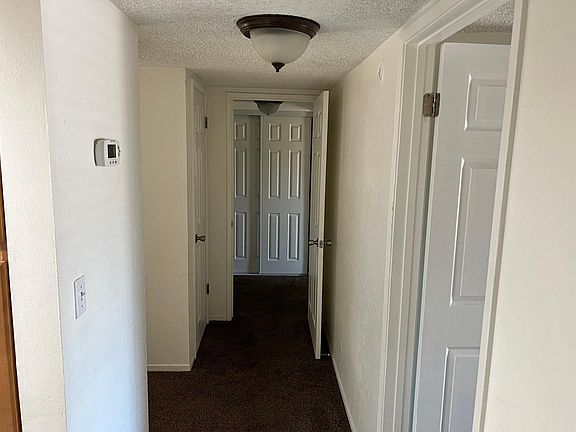 entry. kitchen to the left. rooms to the right. closet ahead to the left bedroom