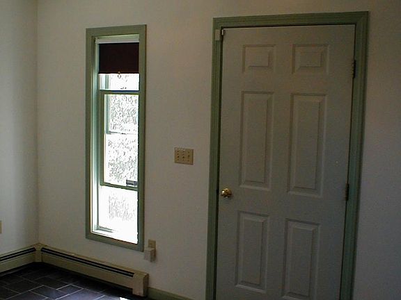mud room/foyer to stairs out to side of home