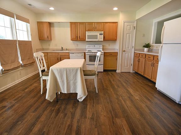 Eat-in kitchen with lots of prep space, dishwasher, and pantry.