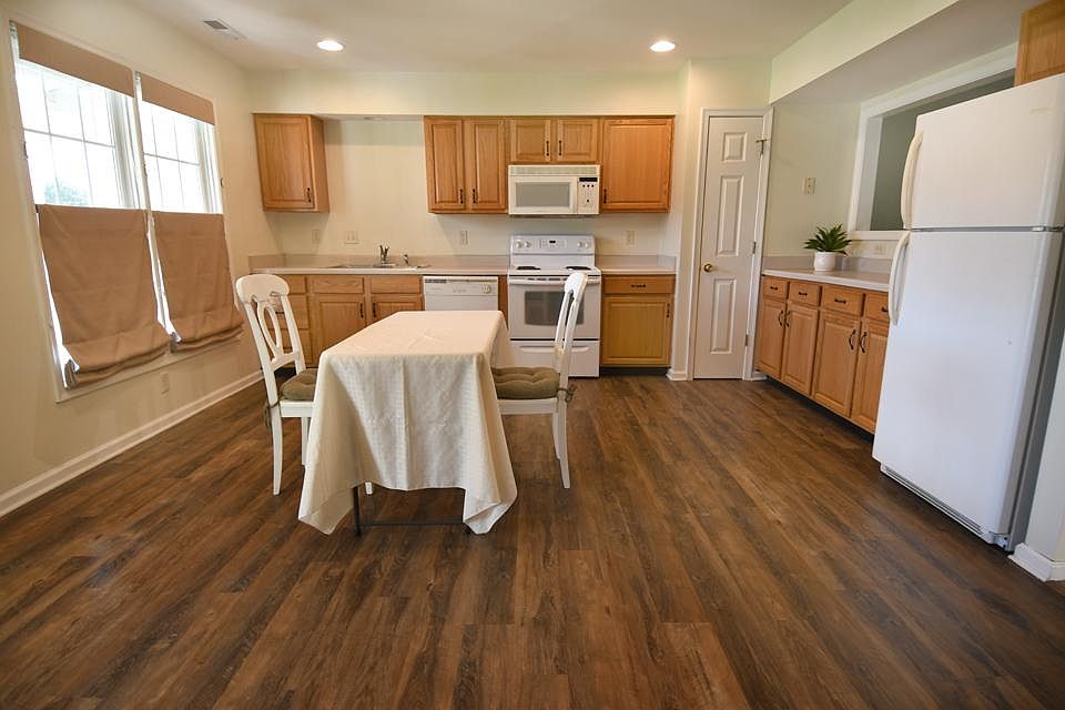 Eat-in kitchen with lots of prep space, dishwasher, and pantry.