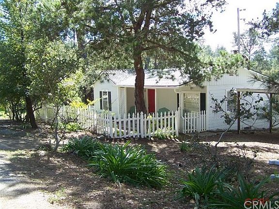 2 gates provide entry to front yard and covered porch.