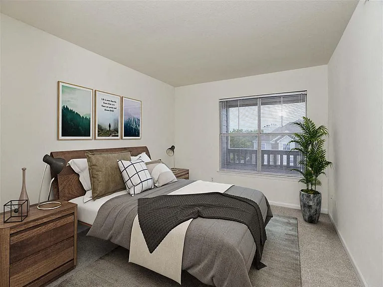 Spacious bedroom with bright natural lighting at The Crossings at Russett in Laurel, MD