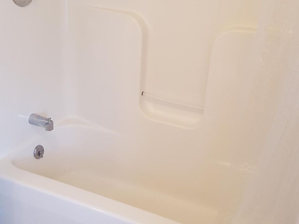 Tub with shower