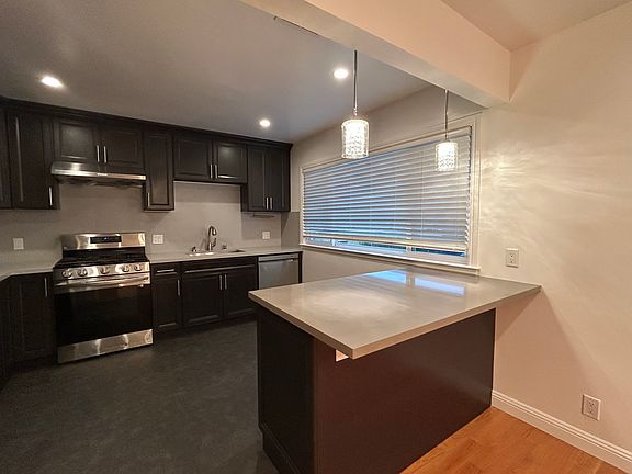 Kitchen with stainless steel appliances and granite countertops