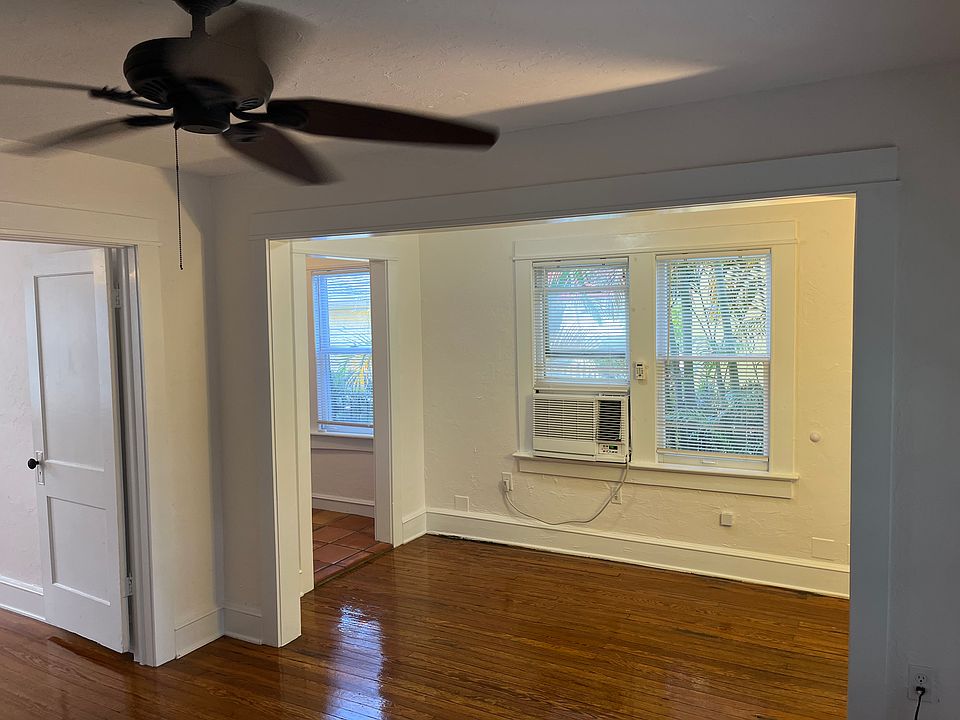 Dining area . Doorway to kitchen and bedroom