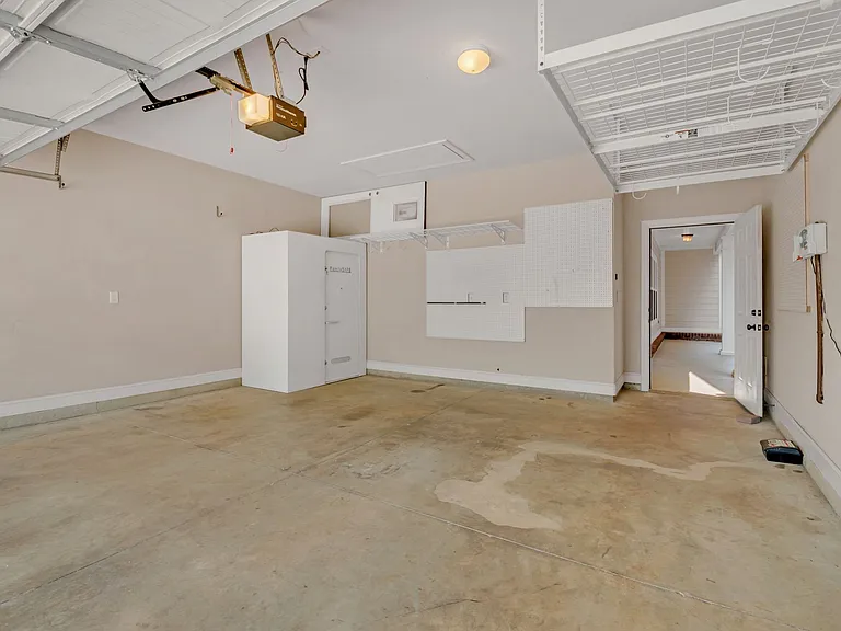 Garage includes overhead storage and tornado shelter