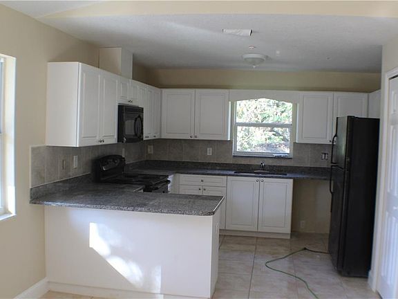 5th image of 12209 N Ola Ave