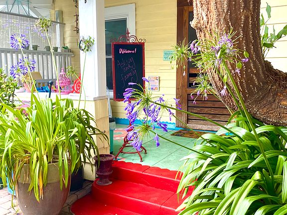 porch for surf boards/bikes. covered inside locking gate. private. safe